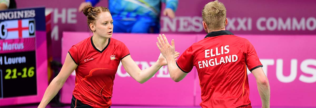 1200×410 B2022 team announcement Marcus Ellis and Lauren Smith celebrate a point at the 2018 Commonwealth Games